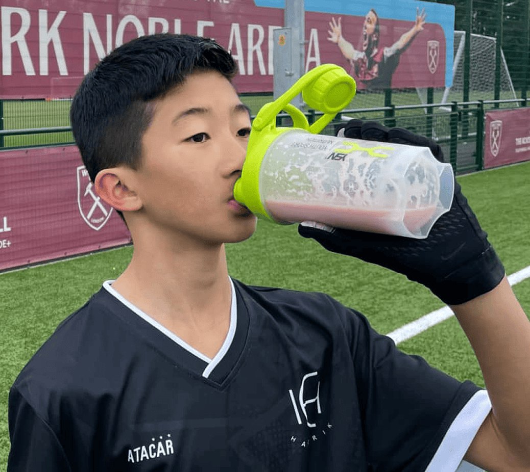 Young footballer drinking a NUTRI-TEEN shake