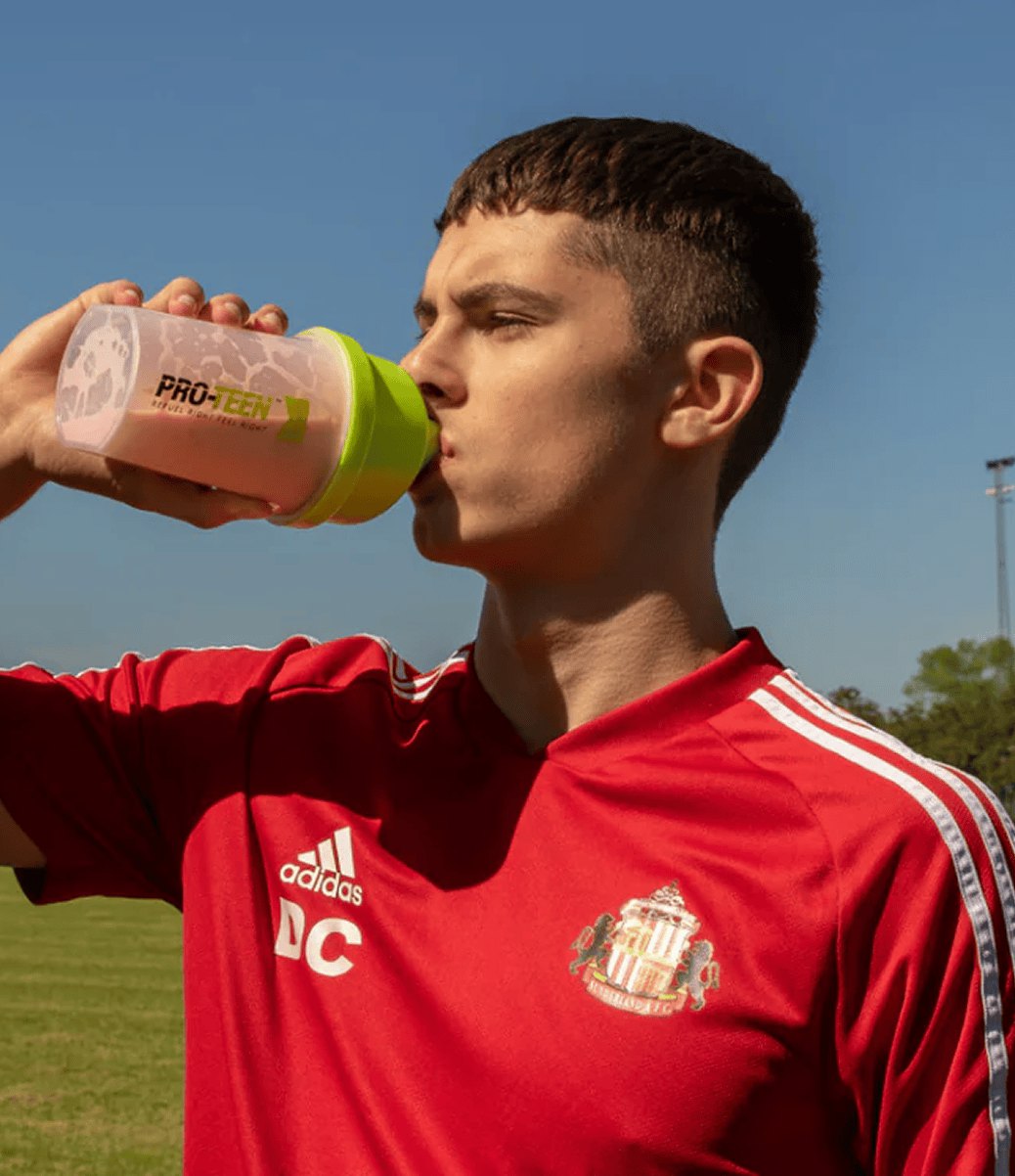 Young athlete drinking a NUTRI-TEEN shake